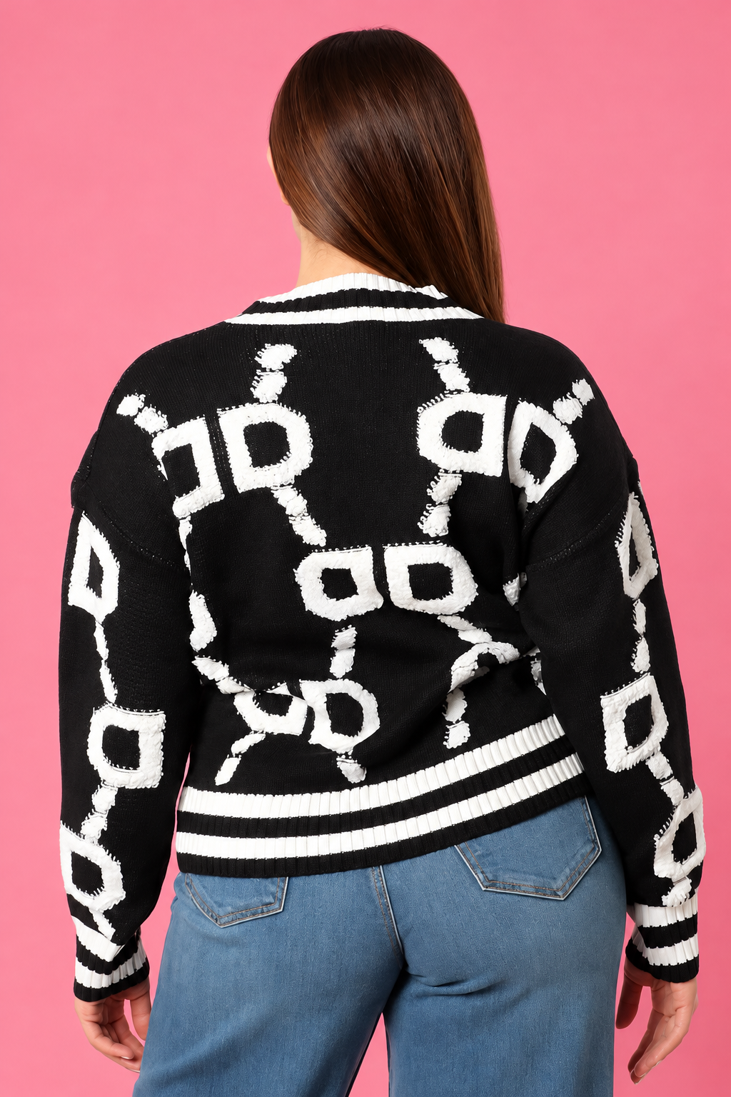 D Sweater black and white knit back view on pink studio background