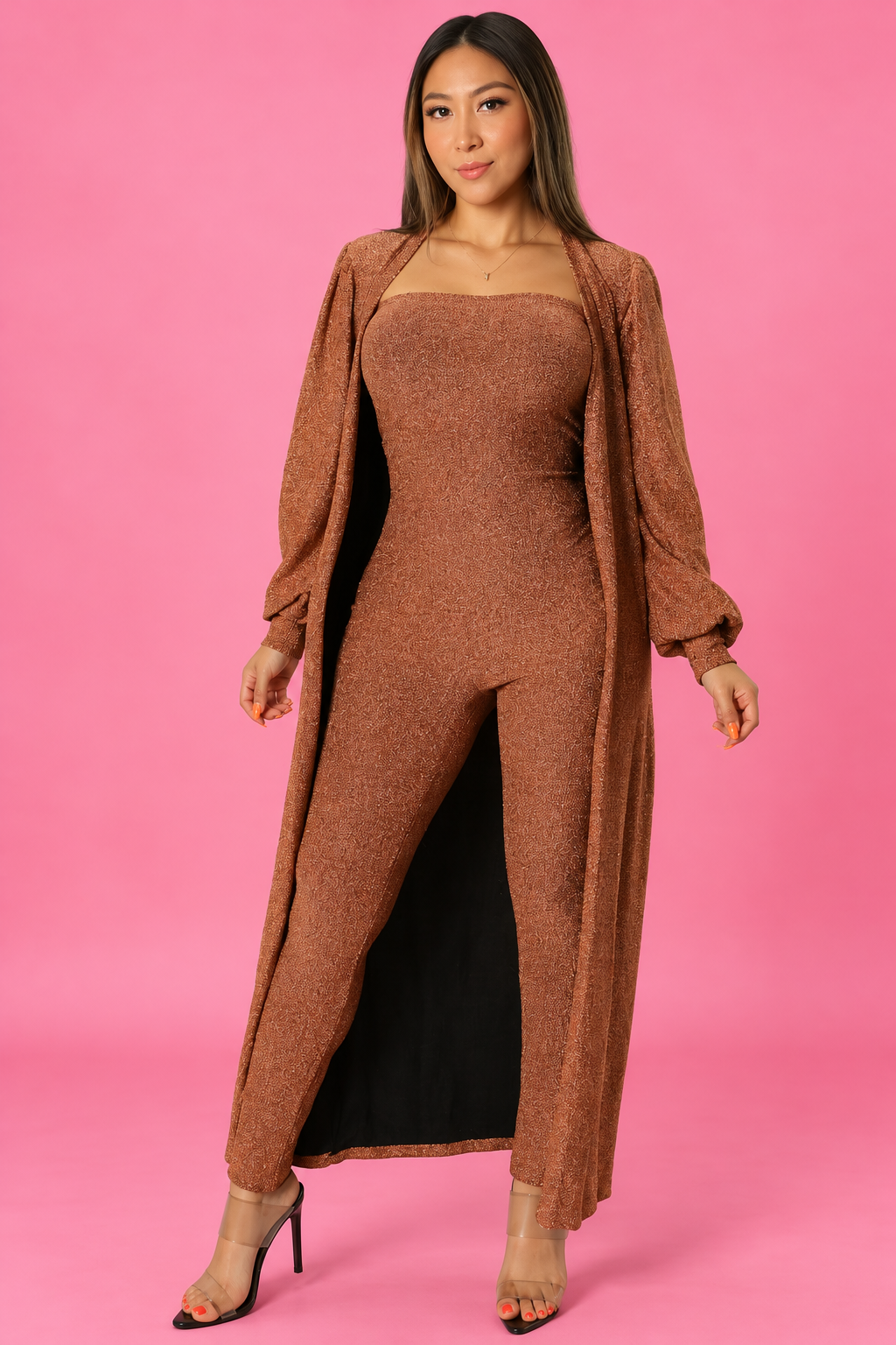 Bronze Joy Set jumpsuit and cardigan on pink studio background